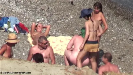 The pervert arranged video surveillance behind a crowd of nudists