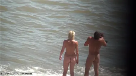 Watch naked nudists on the beach