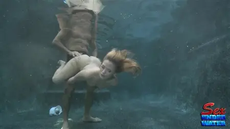 Slender chick the guy fucks under water